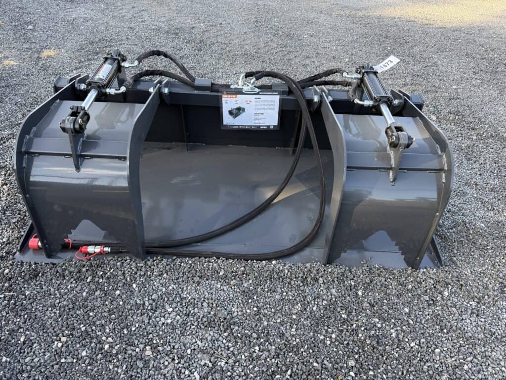 Large industrial bucket attachment for construction equipment.