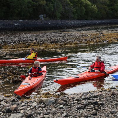 Canoe and Kayak fleet on the shores of Gairloch
