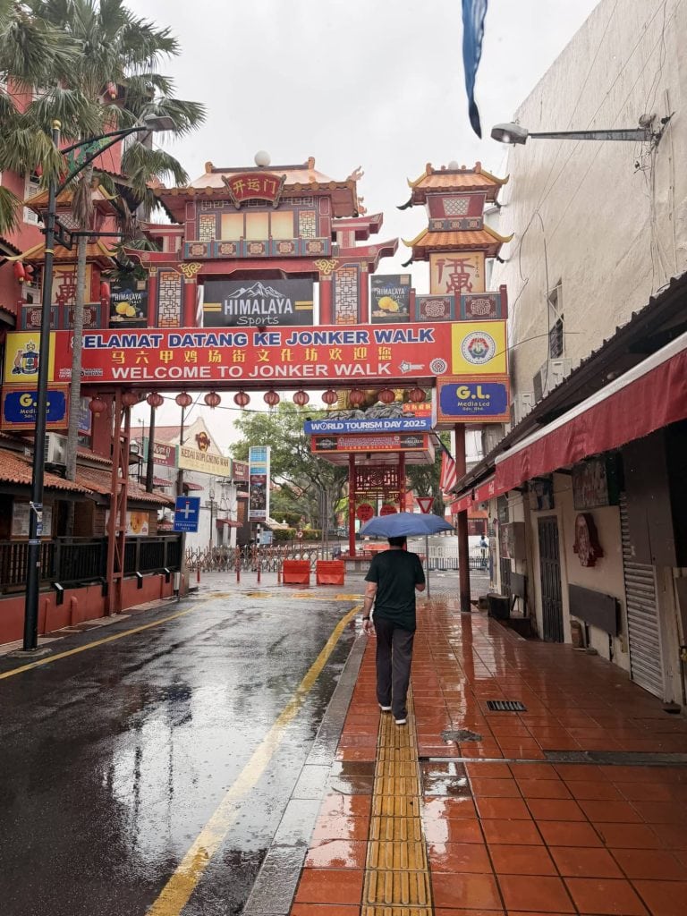 Themed entrance arch at Jonker Walk in Malacca, Malaysia, with vibrant colors and traditional design.