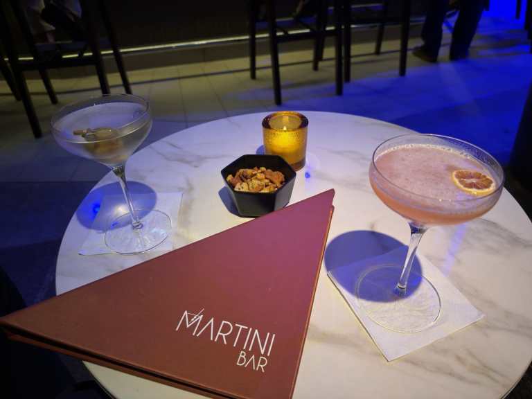 Stylish martini cocktails on a marble table at Martini Bar.