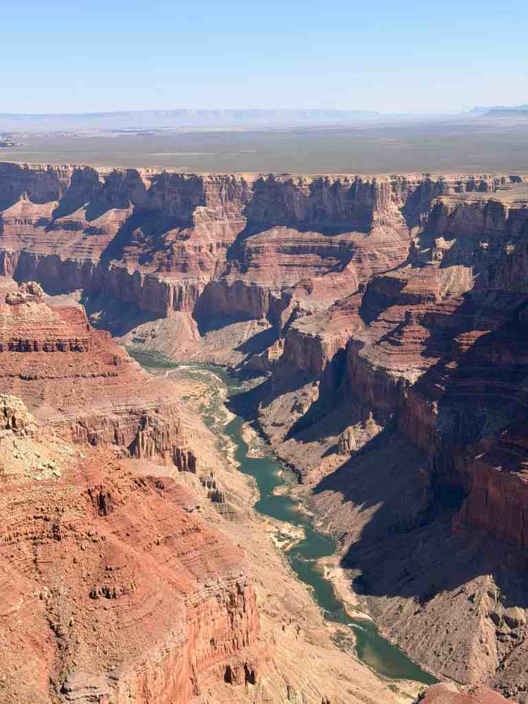 LiAnn and Theo exploring the Grand Canyon's breathtaking views.