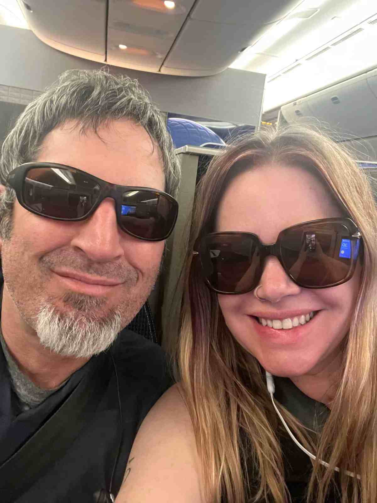 LiAnn and Theo wearing sunglasses on travel adventure.