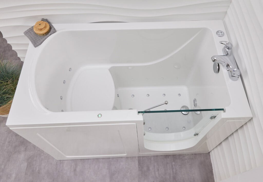 Side view Walk in bath Milano's (Georgia) built in seat and gripped floor