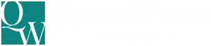 Quinn & Wilson Realtors professional logo.