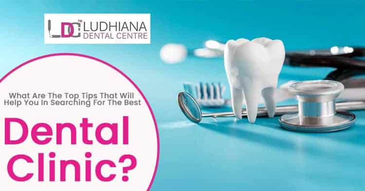 Tooth model with dental tools on blue background at Ludhiana Dental Centre, dental care and dentistry services.