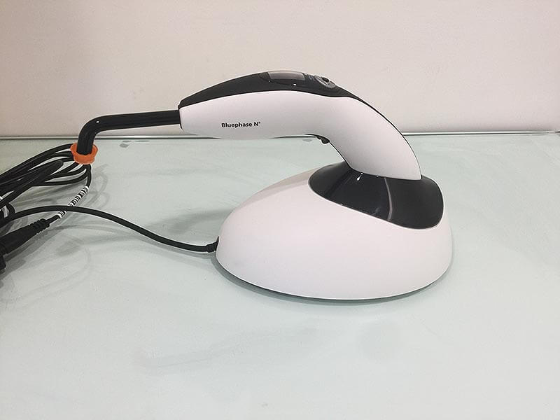 Wireless dental curing light for precise teeth whitening and dental procedures at Ludhiana Dental Centre.