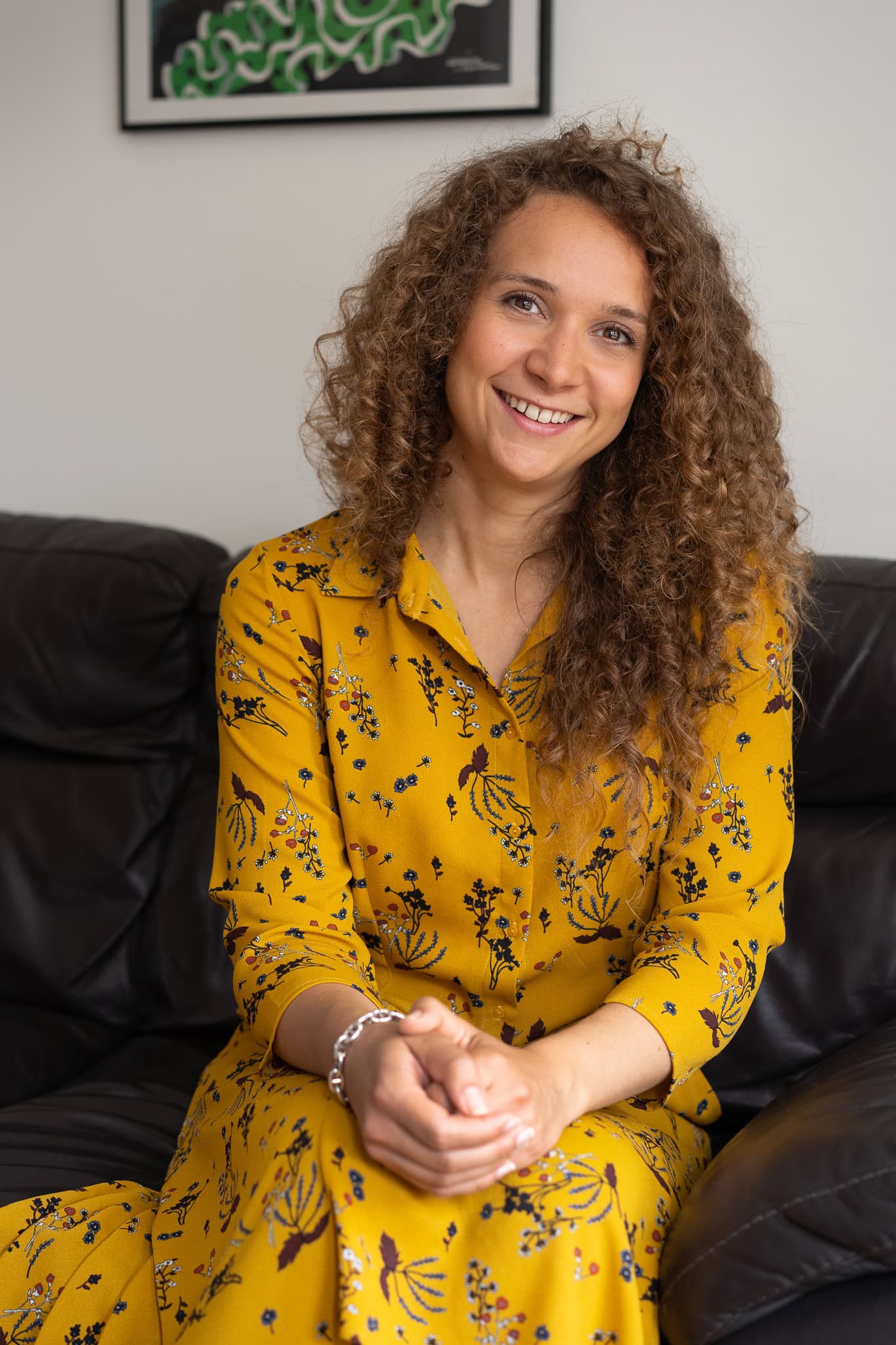 Lorraine Wilkes, a coach, in a warm London studio, captured by a brand photographer.