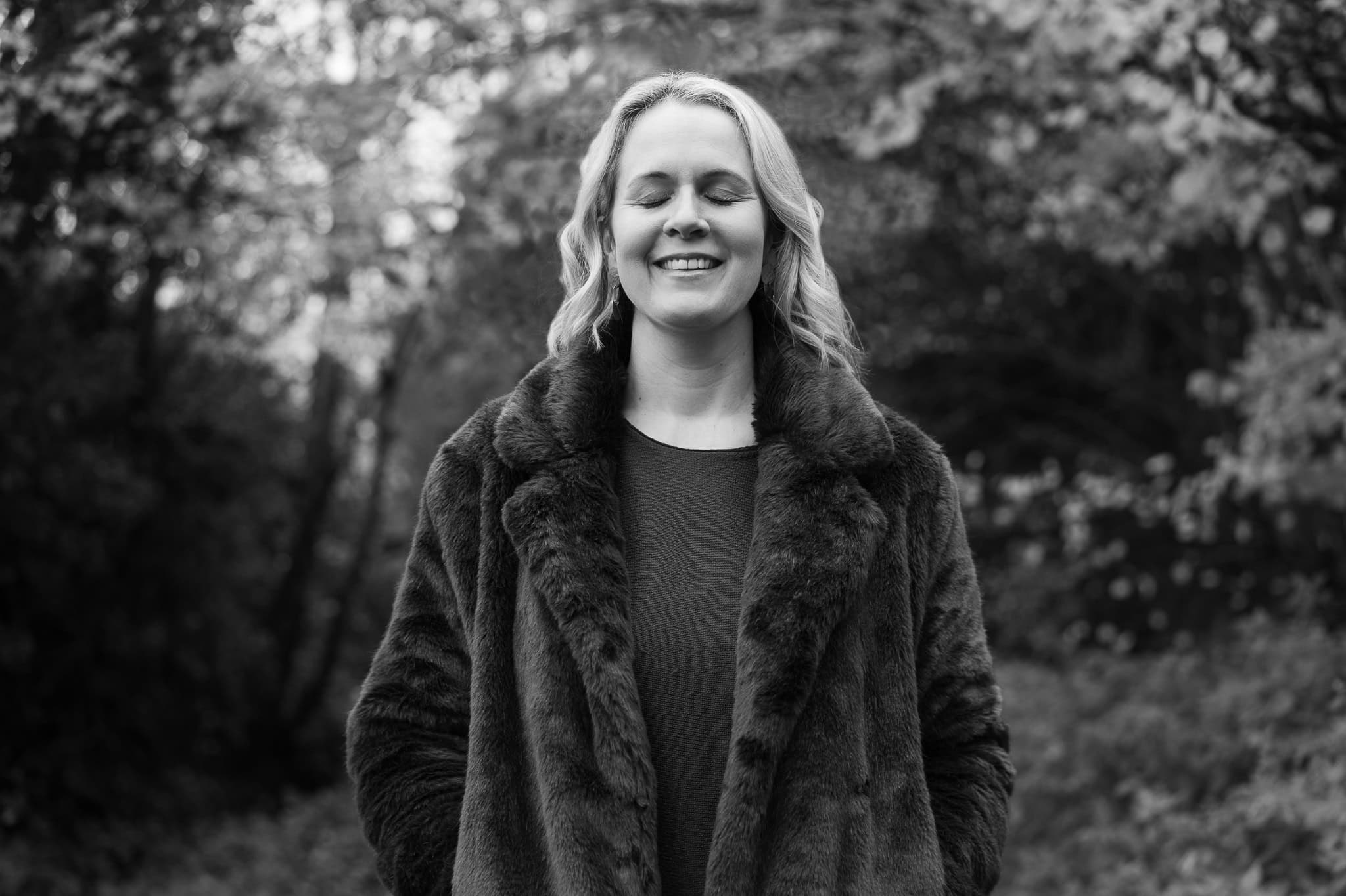 Claire Mackinnon, a coach, in a warm, natural portrait by London brand photographer Phil Askew.