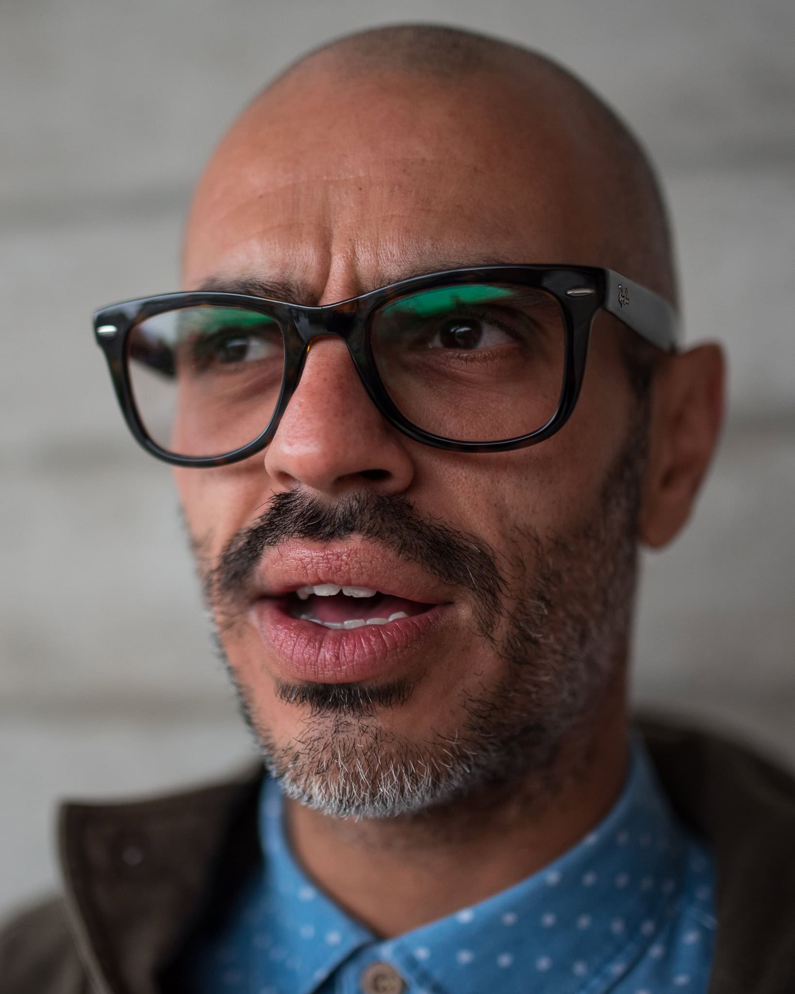 Phil Askew, London brand photographer, captures Cahit Ali's authentic presence in a warm, natural light portrait.
