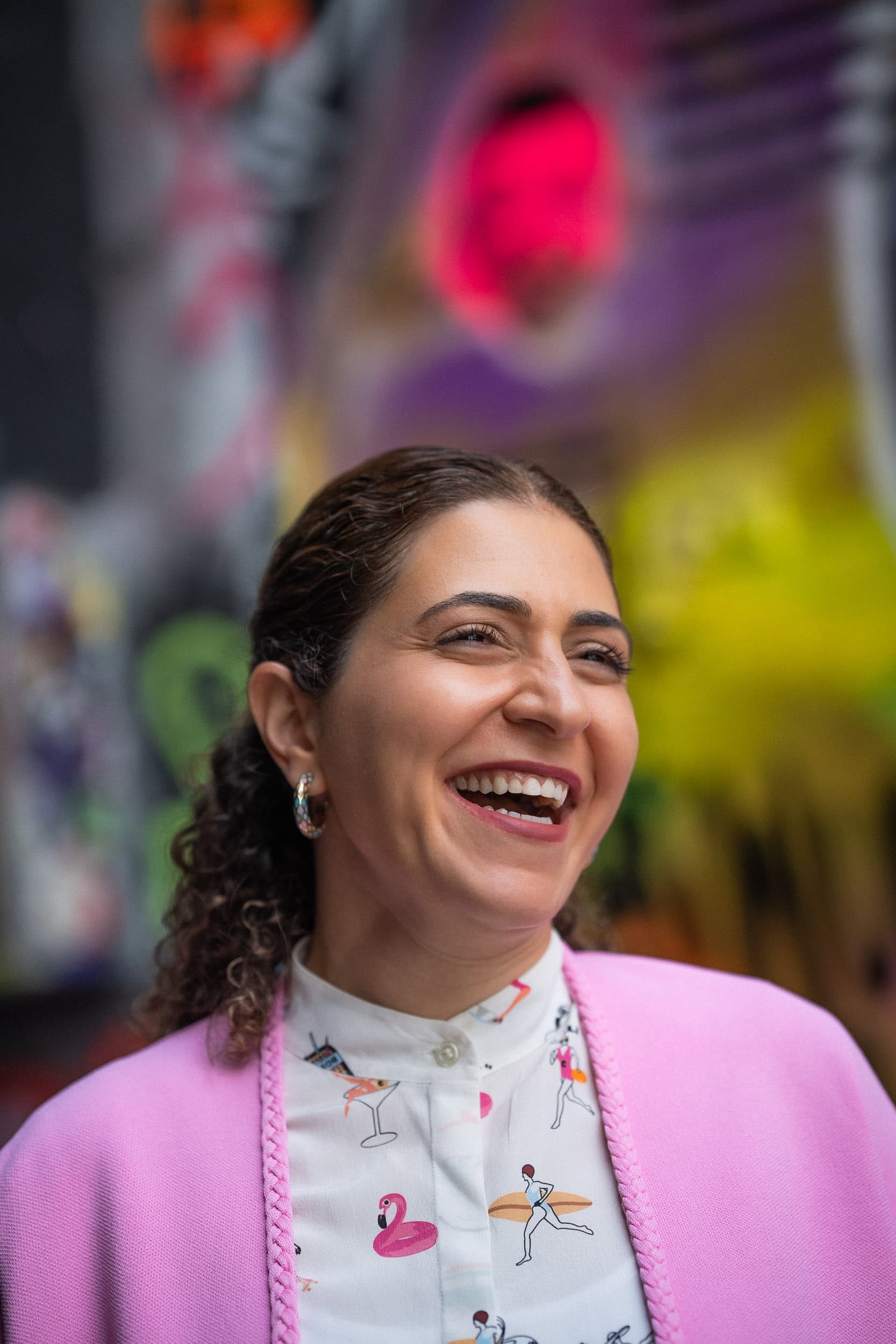 Phil Askew, London brand photographer, captures a coach's authentic joy in this vibrant personal brand portrait.