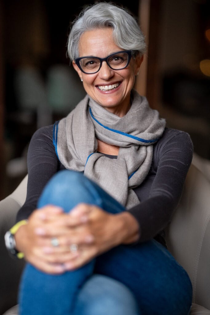 Phil Askew, London brand photographer, captures a confident coach in warm light for brand photography.