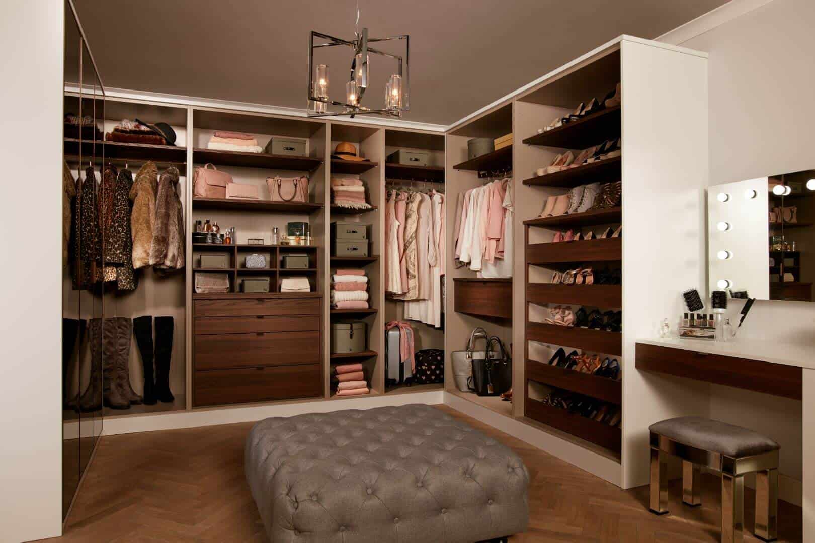 Custom walk-in wardrobe with bespoke storage solutions, designed by Made 2 Measure Interiors.