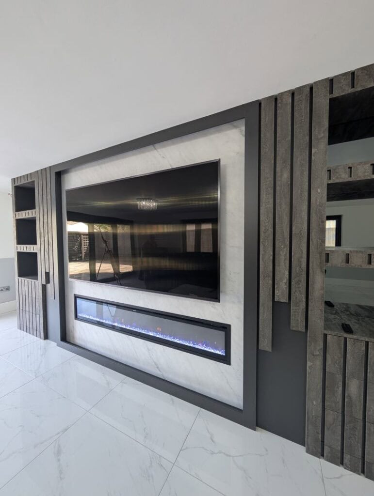 Contemporary custom-built media wall with sleek surround and modern design accents.