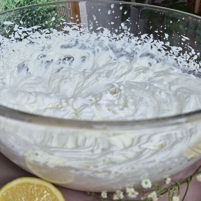 Creamy, fluffy whipped cream for desserts and toppings. Easy homemade recipe for delicious treats.