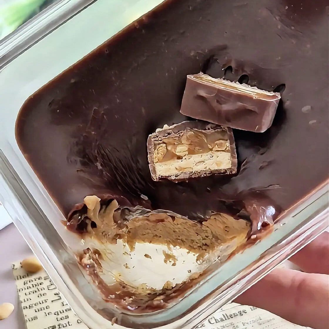 Rich, creamy chocolate dessert with nuts and layers.