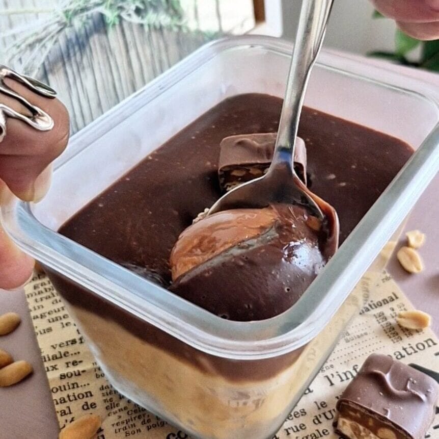 Rich and creamy chocolate ganache in a glass container ready to enjoy. Perfect for desserts and baking.