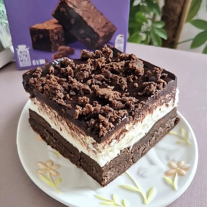 No-bake Milka brownie cake with mascarpone cream and chocolate ganache topping (layered dessert).