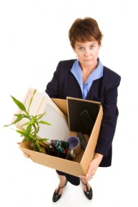 Fired woman with belongings in box