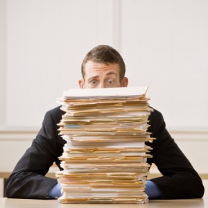 Businessman with too much work