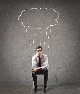 Unlucky businessesman under a cloud