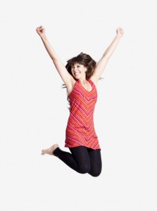 Happy successful writer jumps for joy