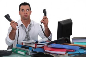 Overworked freelance writer takes angry client phone calls