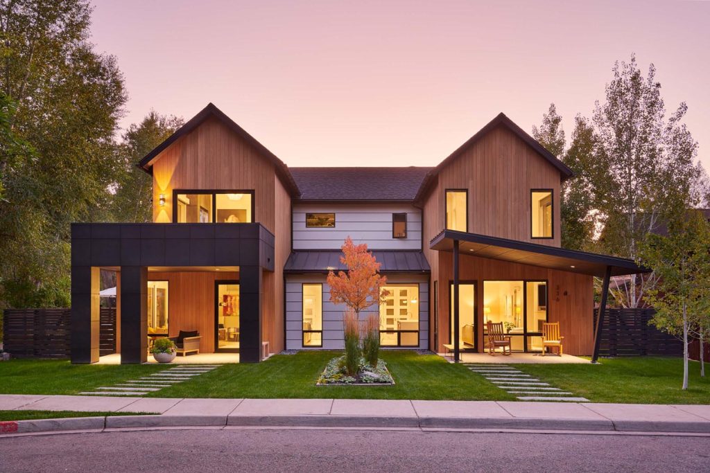 A curbside view of a luxury home