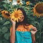 Woman Holding Sunflower 