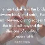 woman holding green healing crystal for heart chakra healing with quote text that reads “The heart chakra is the bridge between body and spirit, Earth and Heaven, giving access to the true self beyond the illusions of duality.” - Anodea Judith manifesteveryday.com