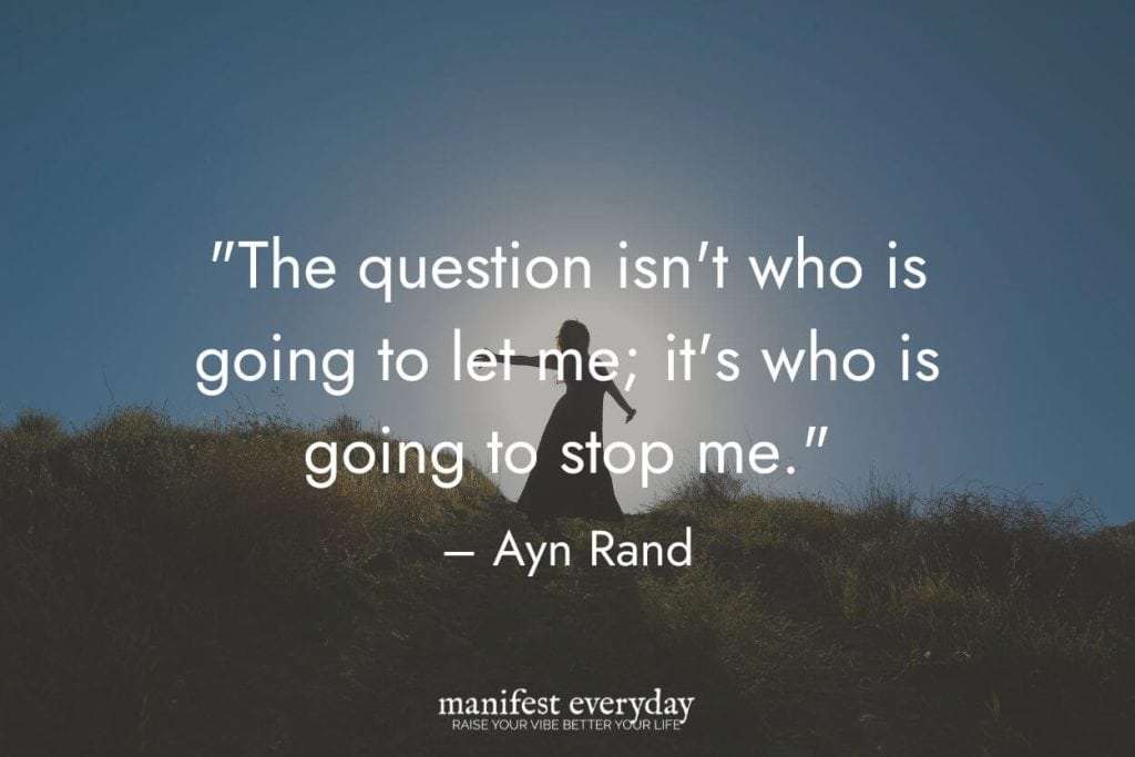 A woman's silhouette on the top of a grassy hill after sunset looking victorious with quote text that reads the question isn't who is going to let me; it's who is going to stop me. -Ayn Rand manifesteveryday.com