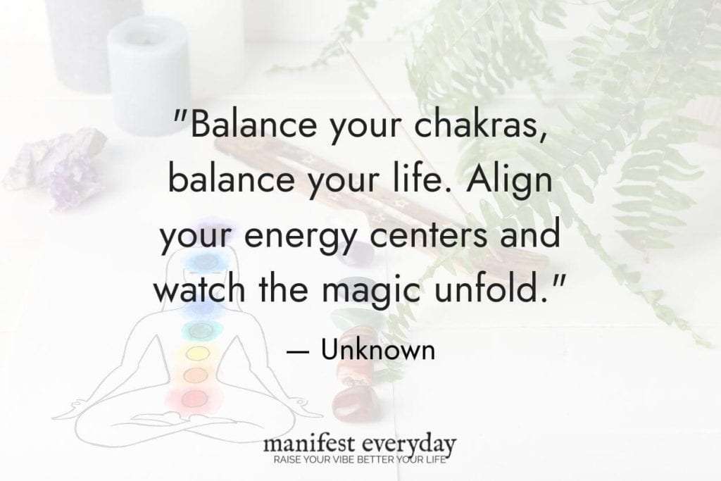 A table with a drawing of the chakra energy centers on a body with chakra colored crystals next to it and a plant and candles wtih quote text that reads balance your chakras, balance your life. Align your energy centers and watch the magic unfold. - unknown manifesteveryday.com