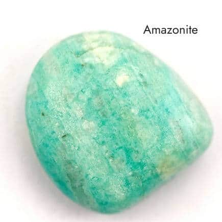tumbled aqua and white colored Amazonite stone on white background