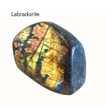 smooth Labradorite crystal with white background