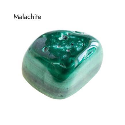 tumbled green malachite stone on white background