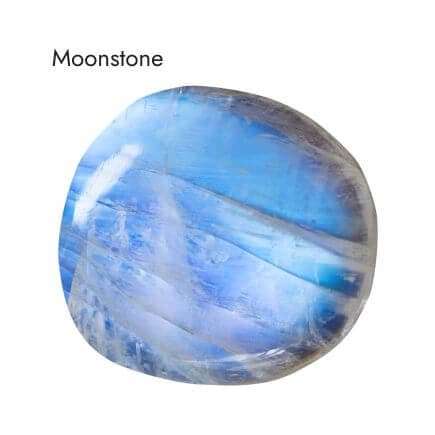 smooth, round, iridescent, bluish, purple moonstone crystal on white background