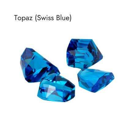 four swiss blue topaz crystals on white background