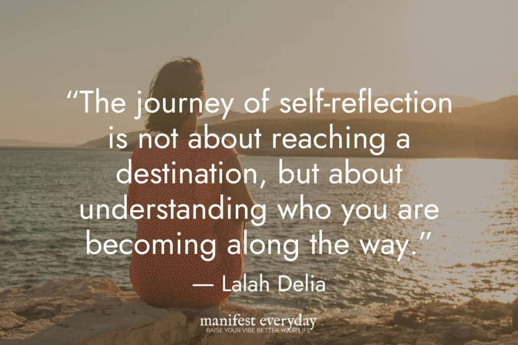 woman sits on rock by water at sunset with quote text that reads “The journey of self-reflection is not about reaching a destination, but about understanding who you are becoming along the way.” - Lalah Delia manifesteveryday.com