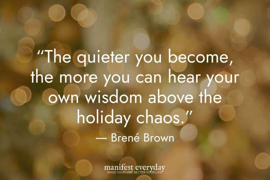 bokeh christmas colors with quote text that reads “The quieter you become, the more you can hear your own wisdom above the holiday chaos.” - Brené Brown manifesteveryday.com