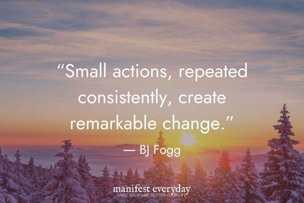 'Small actions, repeated consistently, create remarkable change.' - BJ Fogg | Motivational quote overlaid on sunset winter forest landscape with snow-covered evergreen trees. manifesteveryday.com