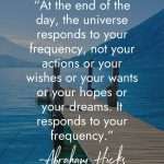 Wooden dock extending into calm blue lake with mountains in background featuring Abraham Hicks quote about manifestation: At the end of the day, the universe responds to your frequency, not your actions or your wishes or your wants or your hopes or your dreams. It responds to your frequency. manifesteveryday.com