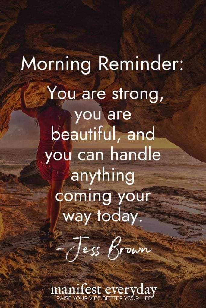 Empowering morning quote from Jess Brown against beach cave scene with woman in red dress: "Morning Reminder: You are strong, you are beautiful, and you can handle anything coming your way today." manifesteveryday.com