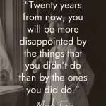 Thought-provoking Mark Twain quote on black and white image of man by window: "Twenty years from now, you will be more disappointed by the things that you didn't do than by the ones you did do." manifesteveryday.com