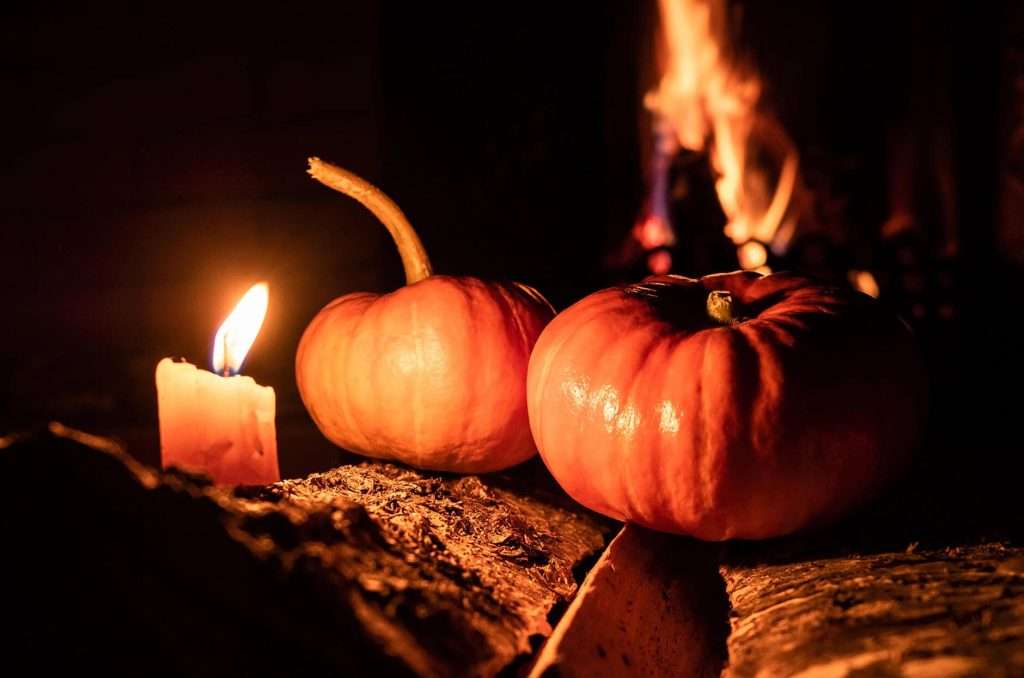 Pumpkin Samhain candles for manifestation and positive energy.