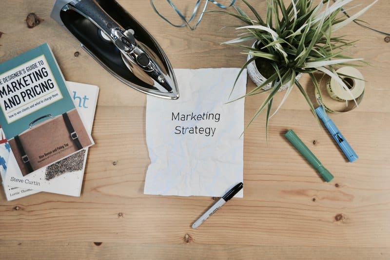 Desk with a marketing strategy note