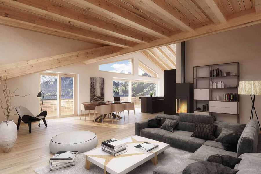 Spacious living room with exposed wooden beams, large windows with mountain views, modern furniture, and a corner fireplace.