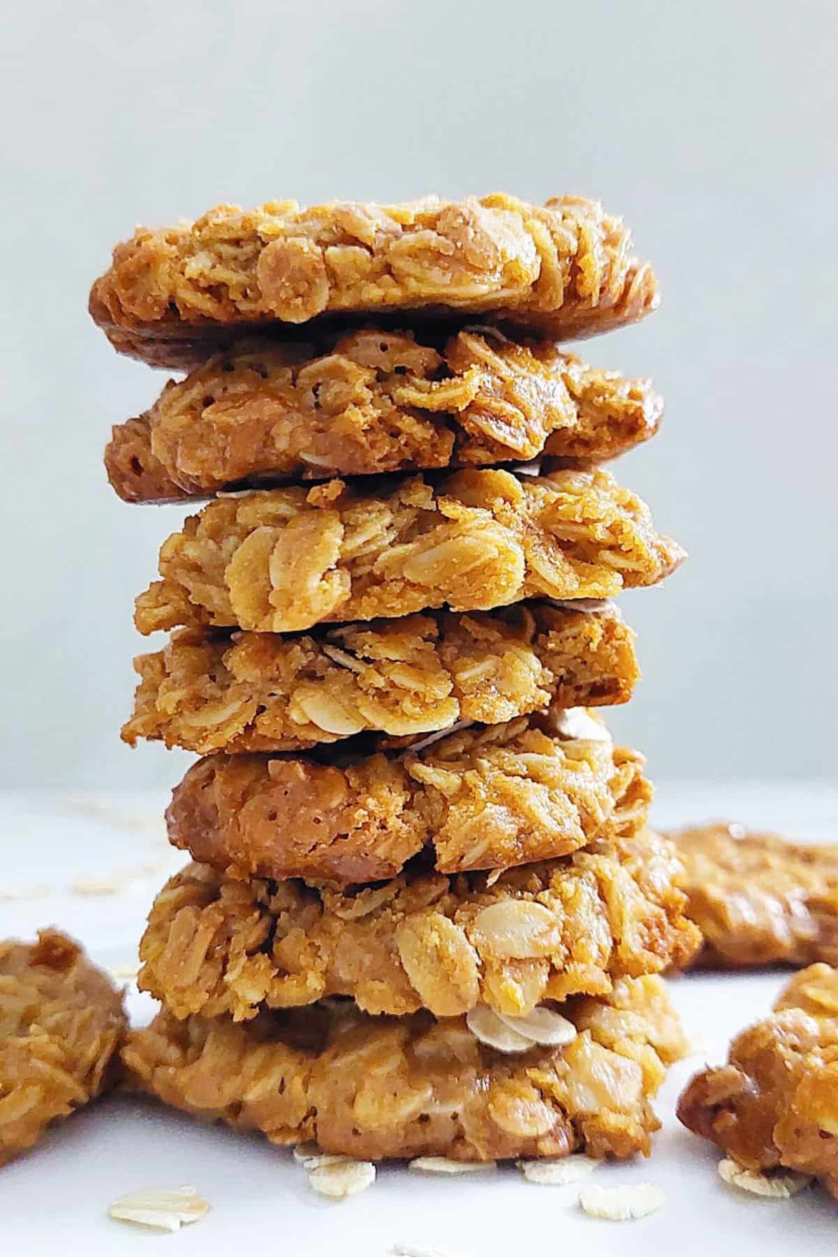 close-up of a few cookies stacked, with more cookies on the side