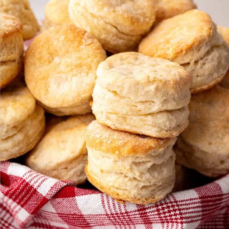fluffy 3 ingredient biscuits in a basket piled high