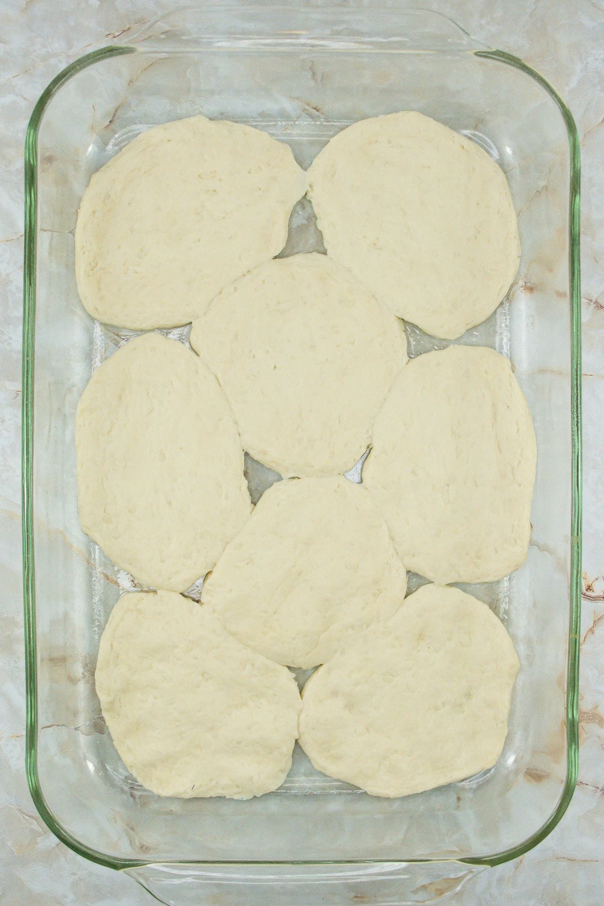 Biscuits and Gravy Casserole biscuits and press into a single layer