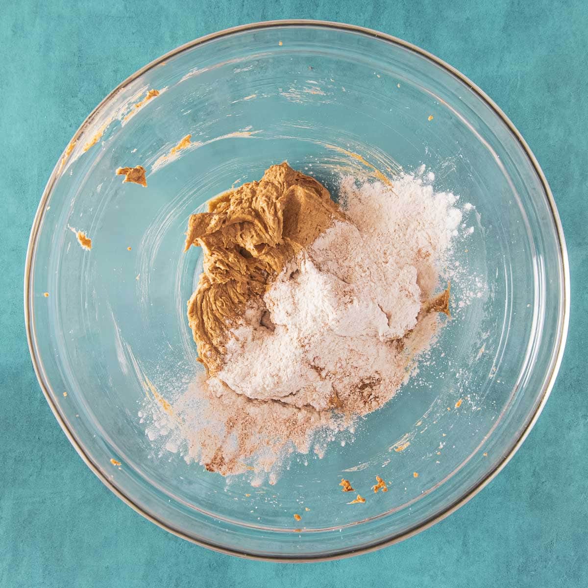 Flour mixture added to wet ingredients.