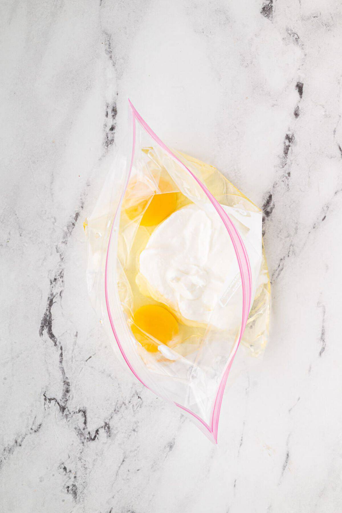 Yogurt and eggs combined in a bag.